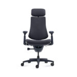 Ergonomic office chair with headrest, dark fabric, padded armrests and five-wheel base for desk use.